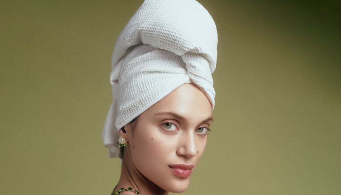 woman with white towel wrapped around head